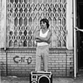 Larry Racioppo. A young man with a boombox on 18th Street in 1980..jpg